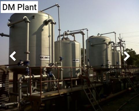 Industrial water treatment plant with filtration tanks and pipes