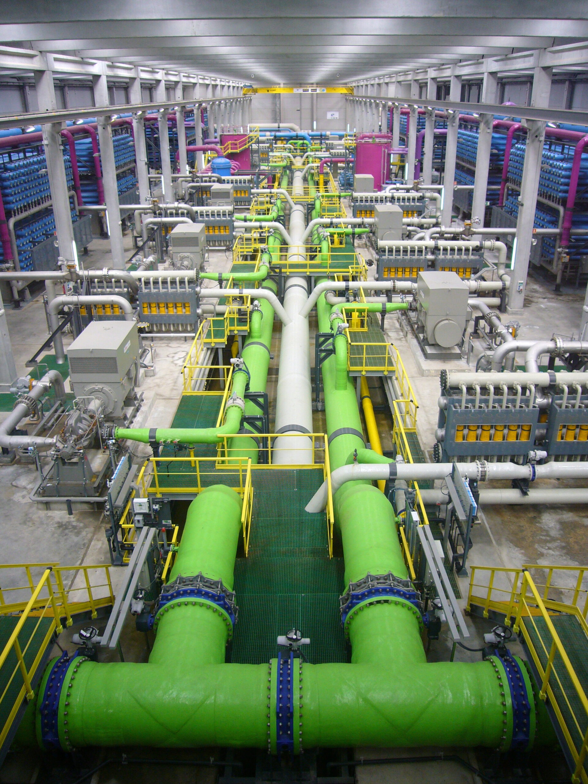 Reverse osmosis seawater desalination plant industrial facility showing pressure vessels and piping systems