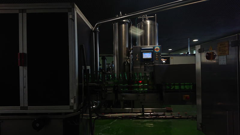 Bottled water filling production line at a food and beverage factory